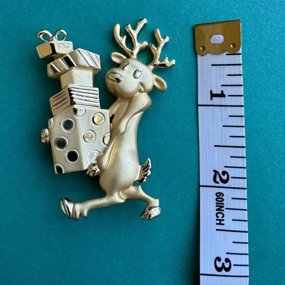 Vintage AJC Christmas Reindeer Carrying Gifts Matte Gold Tone Brooch Pin